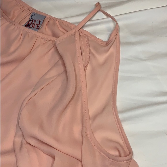 Peach colored cold shoulder top. - Picture 3 of 4